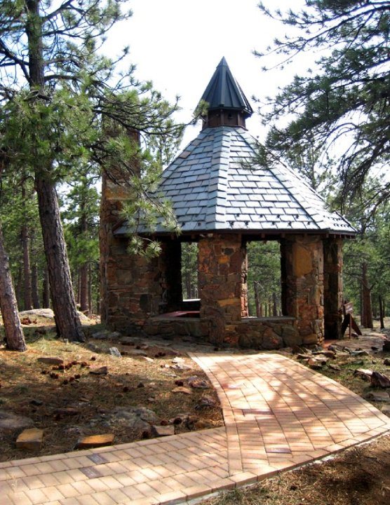 The stone gazebo among the pines
